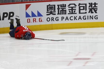 Apr 24, 2022; Washington, District of Columbia, USA; Washington Capitals left wing Alex Ovechkin (8) lies on the ice after being injured while crashing into the boards after being tripped on a breakaway attempt against the Toronto Maple Leafs in the third period at Capital One Arena. Mandatory Credit: Geoff Burke-USA TODAY Sports