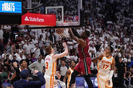 Apr 26, 2022; Miami, Florida, USA; Miami Heat center Bam Adebayo (13) dunks the ball over Atlanta Hawks guard Kevin Huerter (3) during the second half in game five of the first round for the 2022 NBA playoffs at FTX Arena. Mandatory Credit: Jasen Vinlove-USA TODAY Sports