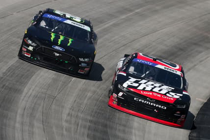 Apr 30, 2022; Dover, Delaware, USA; NASCAR Xfinity Series driver Josh Berry (8) races driver Riley Herbst (98) during the A-Game 200 at Dover Motor Speedway. Mandatory Credit: Matthew OHaren-USA TODAY Sports
