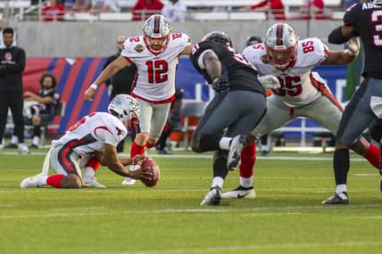 Apr 30, 2022; Birmingham, AL, USA; Tampa Bay Bandits kicker Tyler Rausa (12) kicks the game winning field goal against the Houston Gamblers with 14 seconds left in the second half at Protective Stadium. Mandatory Credit: Vasha Hunt-USA TODAY Sports