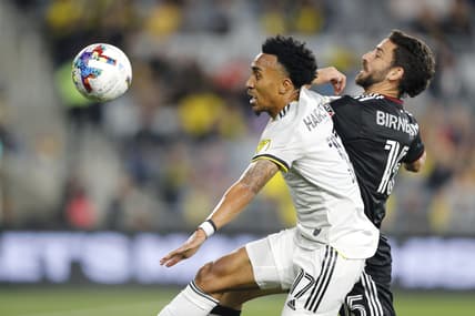 Apr 30, 2022; Columbus, Ohio, USA;  Columbus Crew midfielder Marlon Hairston (17) shields D.C. United defender Steve Birnbaum (15) from the ball during the first half at Lower.com Field. Mandatory Credit: Joseph Maiorana-USA TODAY Sports