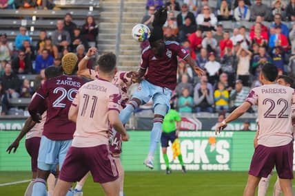 eApr 30, 2022; Commerce City, Colorado, USA; Colorado Rapids defender Lalas Abubakar (6) heads the ball against the Portland Timbers in the first half at Dick's Sporting Goods Park. Mandatory Credit: Ron Chenoy-USA TODAY Sports