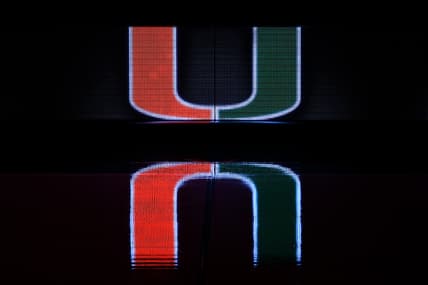 Dec 8, 2020; Coral Gables, Florida, USA; A general view of a reflection of the Miami Hurricanes school logo on the scorers table prior to the game between the Miami Hurricanes and the Purdue Boilermakers at Watsco Center. Mandatory Credit: Jasen Vinlove-USA TODAY Sports