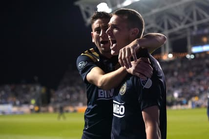 Nov 28, 2021; Philadelphia, Pennsylvania, USA; Philadelphia Union midfielder Deniel Gazdag (front) celebrates after scoring a goal against the Nashville SC during the first half in the conference semifinals of the 2021 MLS playoffs at Subaru Park. Mandatory Credit: Bill Streicher-USA TODAY Sports