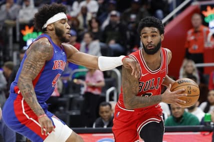 Mar 9, 2022; Detroit, Michigan, USA; Chicago Bulls guard Coby White (0) is defended by Detroit Pistons forward Saddiq Bey (41) in the second half at Little Caesars Arena. Mandatory Credit: Rick Osentoski-USA TODAY Sports