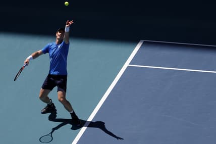 Mar 26, 2022; Miami Gardens, FL, USA; Andy Murray (GBR) serves against Daniil Medvedev (not pictured) in a second round men's singles match in the Miami Open at Hard Rock Stadium. Mandatory Credit: Geoff Burke-USA TODAY Sports
