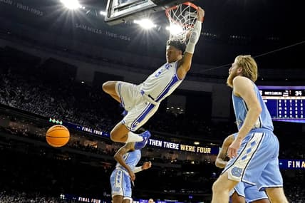 Apr 2, 2022; New Orleans, LA, USA; Duke Blue Devils forward Paolo Banchero (5) dunks the ball against North Carolina Tar Heels forward Brady Manek (45) during the second half in the 2022 NCAA men's basketball tournament Final Four semifinals at Caesars Superdome. Mandatory Credit: Robert Deutsch-USA TODAY Sports