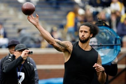 Apr 2, 2022; Ann Arbor, Michigan, USA;  Colin Kaepernick passes during halftime at the Michigan Spring game at Michigan Stadium. Mandatory Credit: Rick Osentoski-USA TODAY Sports