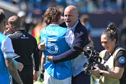 Apr 10, 2022; Charlotte, North Carolina, USA; Charlotte FC head coach Miguel Angel Ramirez celebrates their win against Atlanta United FC at Bank of America Stadium. Mandatory Credit: Griffin Zetterberg-USA TODAY Sports