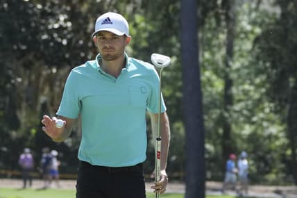 Apr 15, 2022; Hilton Head, South Carolina, USA; Aaron Wise acknowledges the fans after a birdie on the 5th hole during the second round of the RBC Heritage golf tournament. Mandatory Credit: David Yeazell-USA TODAY Sports