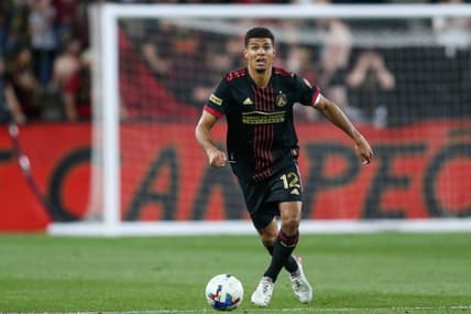 Apr 20, 2022; Kennesaw, Georgia, USA; Atlanta United defender Miles Robinson (12) dribbles against Chattanooga FC in the second half at Fifth Third Bank Stadium. Mandatory Credit: Brett Davis-USA TODAY Sports