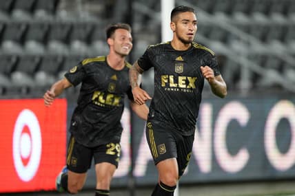 Apr 20, 2022; Los Angeles, California, USA; LAFC forward Cristian Arango (9) and forward Danny Musovski (29) celebrate after a goal against the Orange County SC in the first half at Banc of California Stadium. Mandatory Credit: Kirby Lee-USA TODAY Sports