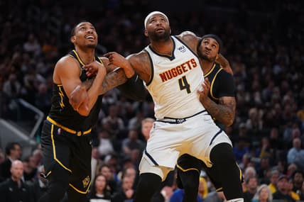 Apr 27, 2022; San Francisco, California, USA; Denver Nuggets center DeMarcus Cousins (4) battles for position with Golden State Warriors forward Otto Porter Jr. (32) and guard Gary Payton II (0) in the fourth quarter during game five of the first round for the 2022 NBA playoffs at Chase Center. Mandatory Credit: Cary Edmondson-USA TODAY Sports