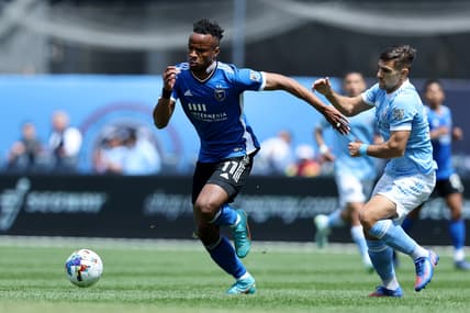 May 1, 2022; New York, New York, USA; San Jose Earthquakes forward Jeremy Ebobisse (11) plays the ball against New York City FC midfielder Nicolas Acevedo (26) during the first half at Yankee Stadium. Mandatory Credit: Brad Penner-USA TODAY Sports