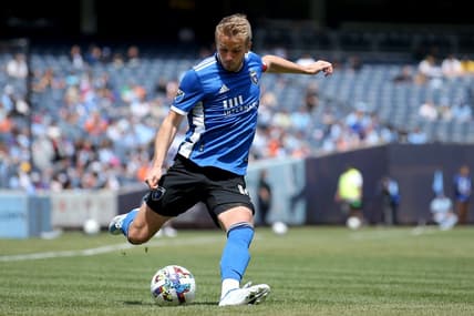 May 1, 2022; New York, New York, USA; San Jose Earthquakes midfielder Jackson Yueill (14) kicks the ball against New York City FC during the first half at Yankee Stadium. Mandatory Credit: Brad Penner-USA TODAY Sports