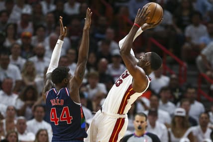 May 2, 2022; Miami, Florida, USA; Miami Heat center Bam Adebayo (13) shoots the basketball over Philadelphia 76ers forward Paul Reed (44) in the fourth quarter during game one of the second round for the 2022 NBA playoffs at FTX Arena. Mandatory Credit: Sam Navarro-USA TODAY Sports