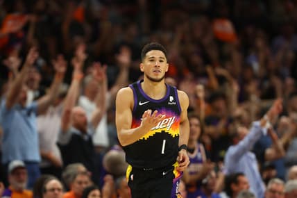 May 4, 2022; Phoenix, Arizona, USA; Phoenix Suns guard Devin Booker (1) reacts after scoring a basket against the Dallas Mavericks during the second half in game two of the second round for the 2022 NBA playoffs at Footprint Center. Mandatory Credit: Mark J. Rebilas-USA TODAY Sports