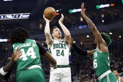 May 7, 2022; Milwaukee, Wisconsin, USA; Milwaukee Bucks guard Pat Connaughton (24) shoots against Boston Celtics guard Marcus Smart (36) during the first quarter during game three of the second round for the 2022 NBA playoffs at Fiserv Forum. Mandatory Credit: Jeff Hanisch-USA TODAY Sports