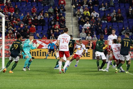 May 7, 2022; Harrison, New Jersey, USA;  New York Red Bulls midfielder Aaron Long (33) scores a goal during the second half against the Portland Timbers at Red Bull Arena. Mandatory Credit: Vincent Carchietta-USA TODAY Sports