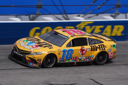 May 8, 2022; Darlington, South Carolina, USA; NASCAR Cup Series driver Kyle Busch (18) races during the Goodyear 400 at Darlington Raceway. Mandatory Credit: Jasen Vinlove-USA TODAY Sports