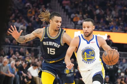 May 9, 2022; San Francisco, California, USA; Golden State Warriors guard Stephen Curry (30) dribbles the basketball against Memphis Grizzlies forward Brandon Clarke (15) during the first quarter of game four of the second round for the 2022 NBA playoffs at Chase Center. Mandatory Credit: Kyle Terada-USA TODAY Sports