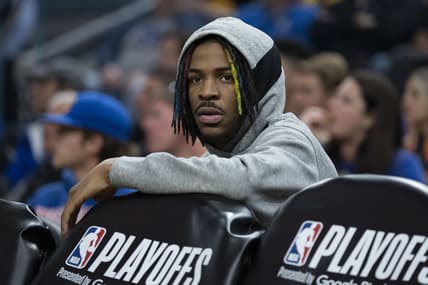 May 9, 2022; San Francisco, California, USA; Memphis Grizzlies guard Ja Morant (12) sits on the bench against the Golden State Warriors during the second quarter of game four of the second round for the 2022 NBA playoffs at Chase Center. Mandatory Credit: Kyle Terada-USA TODAY Sports