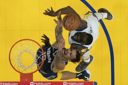 May 9, 2022; San Francisco, California, USA; Memphis Grizzlies forward Brandon Clarke (15) fights for the rebound against Golden State Warriors forward Draymond Green (23) during the second half of game four of the second round for the 2022 NBA playoffs at Chase Center. Mandatory Credit: Kyle Terada-USA TODAY Sports