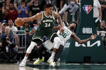 May 13, 2022; Milwaukee, Wisconsin, USA;  Boston Celtics guard Marcus Smart (36) falls away from Milwaukee Bucks forward Giannis Antetokounmpo (34) during the fourth quarter during game six of the second round for the 2022 NBA playoffs at Fiserv Forum. Mandatory Credit: Jeff Hanisch-USA TODAY Sports