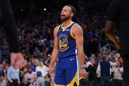May 13, 2022; San Francisco, California, USA; Golden State Warriors guard Stephen Curry (30) walks towards the team bench after making a three point basket against the Memphis Grizzlies in the fourth quarter during game six of the second round for the 2022 NBA playoffs at Chase Center. Mandatory Credit: Cary Edmondson-USA TODAY Sports