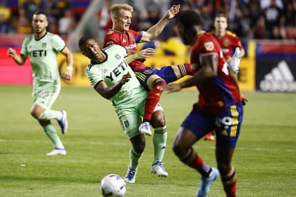 May 14, 2022; Sandy, Utah, USA;  Austin FC midfielder Jhojan Valencia (5) and Real Salt Lake defender Jasper Loffelsend (28) battle in the second half at Rio Tinto Stadium. Mandatory Credit: Jeffrey Swinger-USA TODAY Sports