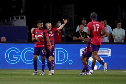 May 14, 2022; Carson, California, USA;  FC Dallas forward Jesus Ferreira (10) celebrates with forward Paul Arriola (7) after scoring against the LA Galaxy during the first half at Dignity Health Sports Park. Mandatory Credit: Kiyoshi Mio-USA TODAY Sports