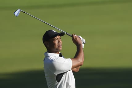May 16, 2022; Tulsa, Oklahoma, USA; Tiger Woods watches his fairway shot on the 10th hole during a practice round for the PGA Championship golf tournament at Southern Hills Country Club. Mandatory Credit: Michael Madrid-USA TODAY Sports