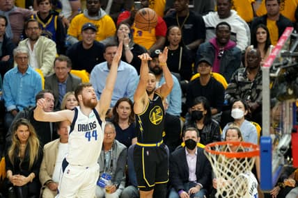 May 18, 2022; San Francisco, California, USA; Golden State Warriors guard Stephen Curry (30) shoots against Dallas Mavericks forward Davis Bertans (44) during the first quarter of game one of the 2022 western conference finals at Chase Center. Mandatory Credit: Darren Yamashita-USA TODAY Sports