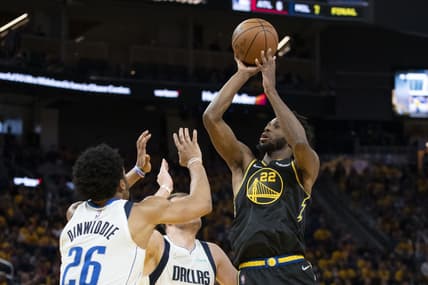 May 18, 2022; San Francisco, California, USA; Golden State Warriors forward Andrew Wiggins (22) shoots the basketball against Dallas Mavericks guard Spencer Dinwiddie (26) during the fourth quarter in game one of the 2022 western conference finals at Chase Center. Mandatory Credit: Kyle Terada-USA TODAY Sports