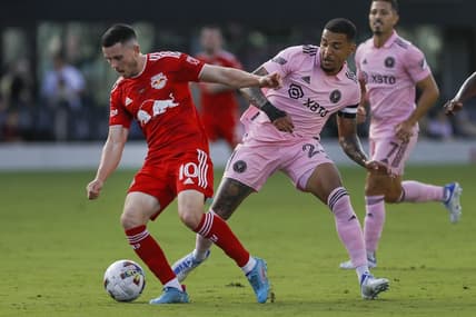 May 22, 2022; Fort Lauderdale, Florida, USA; New York Red Bulls midfielder Lewis Morgan (10) protects the ball from Inter Miami CF midfielder Gregore (26) during the first half at DRV PNK Stadium. Mandatory Credit: Sam Navarro-USA TODAY Sports