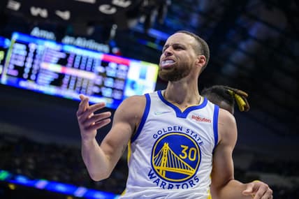 May 22, 2022; Dallas, Texas, USA; Golden State Warriors guard Stephen Curry (30) reacts to being fouled by Dallas Mavericks forward Reggie Bullock (25) during the third quarter in game three of the 2022 western conference finals at American Airlines Center. Mandatory Credit: Jerome Miron-USA TODAY Sports