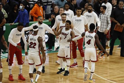 May 27, 2022; Boston, Massachusetts, USA; Miami Heat guard Kyle Lowry (7) greets guard Victor Oladipo (4) and forward Jimmy Butler (22) during the second half in game six of the 2022 eastern conference finals at TD Garden. Mandatory Credit: Winslow Townson-USA TODAY Sports
