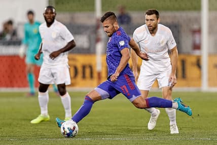 May 28, 2022; Commerce City, Colorado, USA; Colorado Rapids forward Diego Rubio (11) controls the ball as Nashville SC defender Dave Romney (4) defends in the first half at Dick's Sporting Goods Park. Mandatory Credit: Isaiah J. Downing-USA TODAY Sports