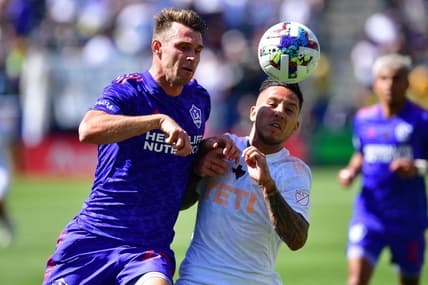 May 29, 2022; Carson, California, USA; Austin FC forward Sebastian Driussi (7) plays for the ball against Los Angeles Galaxy forward Nick DePuy (20)  during the first half at Dignity Health Sports Park. Mandatory Credit: Gary A. Vasquez-USA TODAY Sports