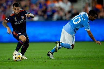FC Cincinnati midfielder Luciano Acosta (11) jukes New York City midfielder Maximiliano Moralez (10) in the second half of the MLS match on Saturday, Sept. 18, 2021, at TQL Stadium in West End. New York City FC defeated FC Cincinnati 2-1.

Fc Cincinnati New York City