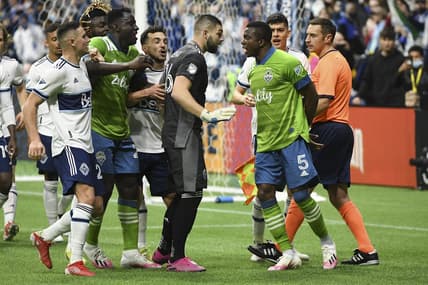 Nov 7, 2021; Vancouver, British Columbia, CAN;  The Seattle Sounders and the Vancouver Whitecaps exchange words during the second half at BC Place. Mandatory Credit: Anne-Marie Sorvin-USA TODAY Sports