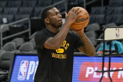 Jan 28, 2022; Charlotte, North Carolina, USA; Los Angeles Lakers guard Kendrick Nunn (12) during pregame warm ups against the Charlotte Hornets at the Spectrum Center. Mandatory Credit: Jim Dedmon-USA TODAY Sports