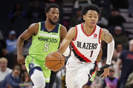 Mar 5, 2022; Minneapolis, Minnesota, USA; Portland Trail Blazers guard Anfernee Simons (1) brings the ball up court past Minnesota Timberwolves guard Malik Beasley (5) in the first quarter at Target Center. Mandatory Credit: Bruce Kluckhohn-USA TODAY Sports