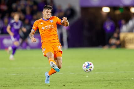 Mar 12, 2022; Orlando, Florida, USA;  FC Cincinnati forward Brandon Vazquez (19) shoots the ball in the second half during a match against Orlando City at Orlando City Stadium. Mandatory Credit: Nathan Ray Seebeck-USA TODAY Sports