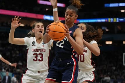 Apr 1, 2022; Minneapolis, MN, USA; UConn Huskies guard Evina Westbrook (22) battles for a rebound with Stanford Cardinal guard Hannah Jump (33) and Stanford Cardinal guard Haley Jones (30) during the second half in the Final Four semifinals of the women's college basketball NCAA Tournament at Target Center. Mandatory Credit: Kirby Lee-USA TODAY Sports