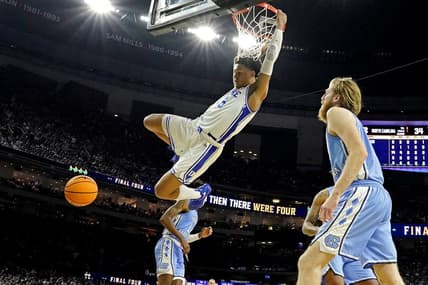 Apr 2, 2022; New Orleans, LA, USA; Duke Blue Devils forward Paolo Banchero (5) dunks the ball against North Carolina Tar Heels forward Brady Manek (45) during the second half in the 2022 NCAA men's basketball tournament Final Four semifinals at Caesars Superdome. Mandatory Credit: Robert Deutsch-USA TODAY Sports