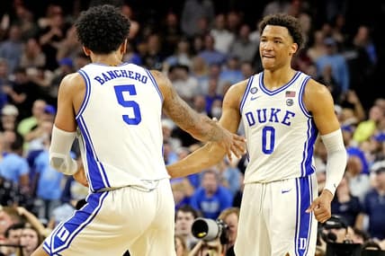 Apr 2, 2022; New Orleans, LA, USA; Duke Blue Devils forward Paolo Banchero (5) and forward Wendell Moore Jr. (0) celebrates after a play during the second half against the North Carolina Tar Heels in the 2022 NCAA men's basketball tournament Final Four semifinals at Caesars Superdome. Mandatory Credit: Robert Deutsch-USA TODAY Sports