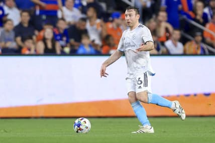 May 21, 2022; Cincinnati, Ohio, USA;  New England Revolution midfielder Thomas McNamara (26) controls the ball against FC Cincinnati in the second half at TQL Stadium. Mandatory Credit: Aaron Doster-USA TODAY Sports