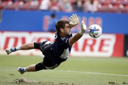 May 22, 2022; Frisco, Texas, USA; FC Dallas goalkeeper Maarten Paes (30) makes a save during warmups before the match against the Minnesota United at Toyota Stadium. Mandatory Credit: Tim Heitman-USA TODAY Sports
