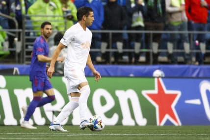 May 29, 2022; Seattle, Washington, USA; Charlotte FC midfielder Brandt Bronico (13) looks to pass while dribbling against the Seattle Sounders FC during the first half at Lumen Field. Mandatory Credit: Joe Nicholson-USA TODAY Sports
